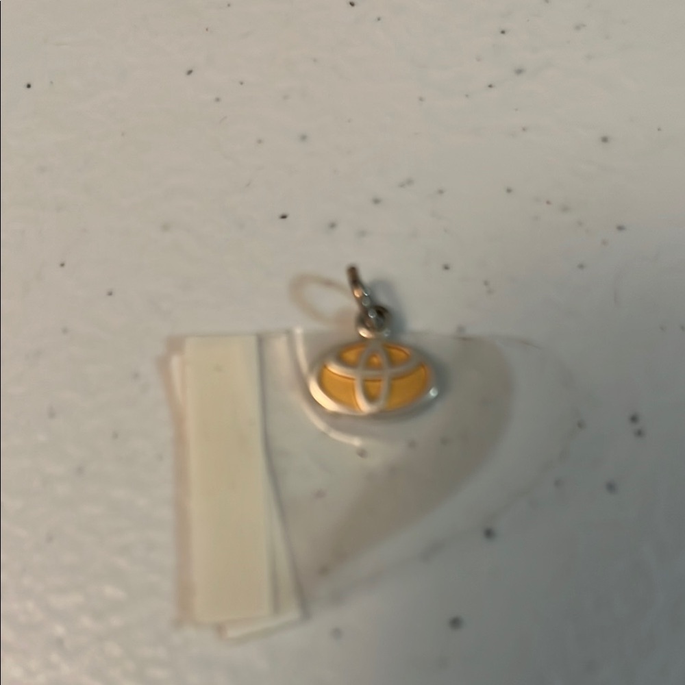 Toyota Camry Silver and Yellow Pendant Charm